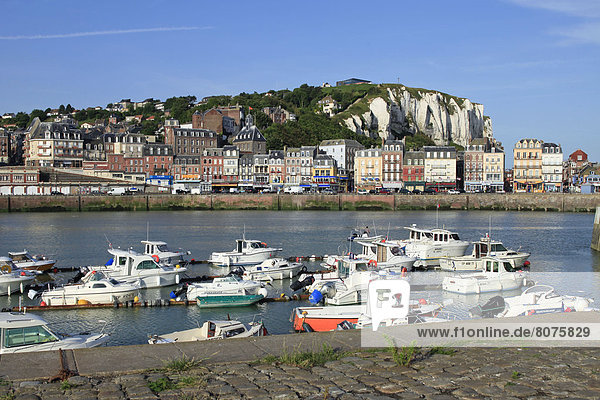 'The Norman coast ''cote d'Albatre'' in the ''Pays de Caux'' area: Le Treport (76). Waterfront in the city of Le Treport with buildings and boats in the harbour. (All rights reserved. Only postcard production)'