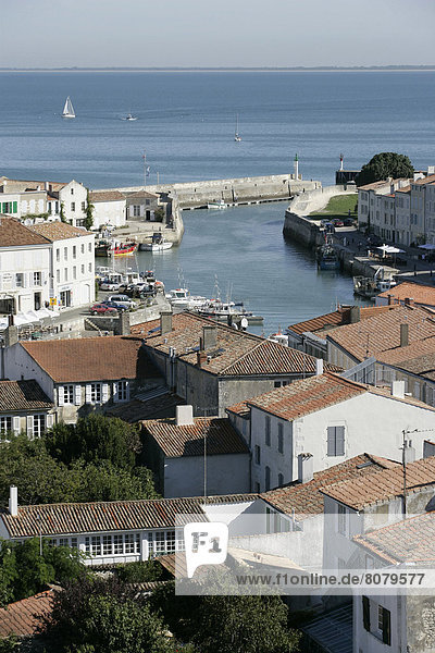 'Aerial view over the harbour of Saint-Martin-de-Re on the Isle of Rhe in the Charente-Maritime department. Saint-Martin-de-Re is one of the island's nicest villages. The fortifications of Saint-Martin-de-Re were erected in the XVIIth century by Vauban to protect the Isle of Rhe from the English invasion forces. Photograph library  ''Ile de Re''  Isle of Rhe. - Saint Martin de re - 2006/10/04'