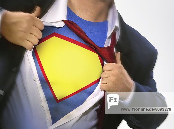 Businessman wearing superhero costume
