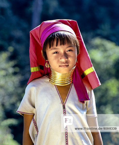 Girl of the Padaung mountain tribe  also known as giraffe women  wearing neck rings