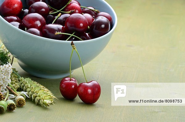 Cherries on a wooden table