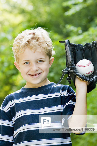Boy With Baseball And Glove