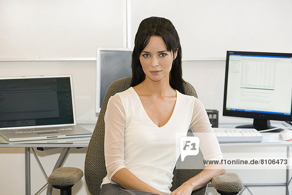 Portrait Of A Woman In An Office