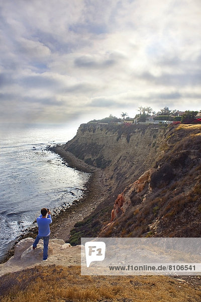 Man Taking A Photo Of The Ocean And Cliffs  Palos Verdes  California