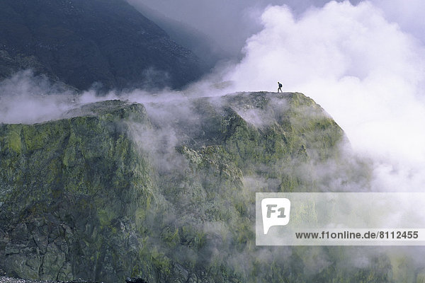 Central America Costa Rica Sky Mountains Plateau Smoke One Person Walking Nature Dense Exploration Edge Heat Fumes Hot Volcano Natural Calamity Active Outdoors Day Side View Distant Horizontal Color Image Photography