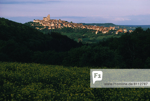 France Vezelay Europe village Horizontal Color image meadow field buildings Landscape