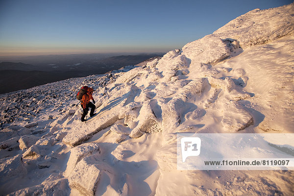 20-24 Years 20s Adventure Backpack Cold Temperature Color Image Copy Space Day Effort Endurance Exploration Full Length Getting Away From It All High Angle View Hiking Hobbies Horizontal Jacket Leisure Activity Mountain Moving Up Mt. Washington New Hampshire One Person Outdoors Photography Recreational Pursuit Rock Snow Sport USA Warm Clothing Young Adult Young Men