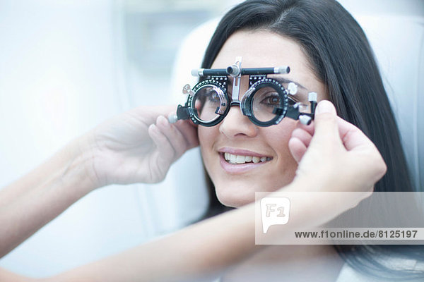 Woman having her eyes examined