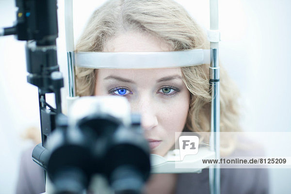 Young woman having eye examination