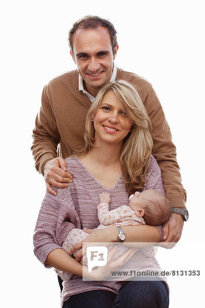 Couple with newborn baby daughter