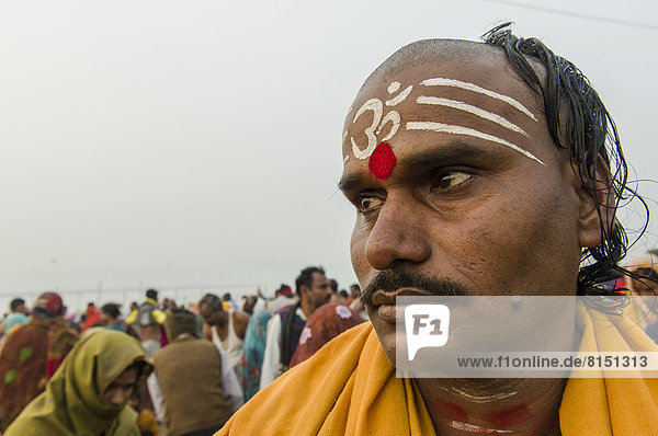 Portrait of a priest at the Sangam  the confluence of the rivers Ganges  Yamuna and Saraswati  during Kumbh Mela