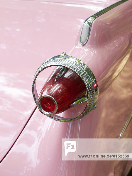 Tail fin of an American road cruiser from the 1950s
