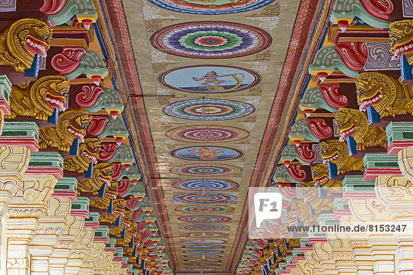 Colourfully painted pillars and ceiling  Ramanathaswami Temple