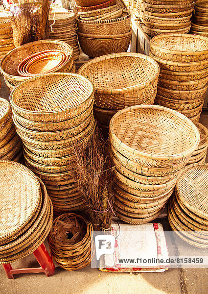 Vietnam  Hoi An  Stack of baskets at market