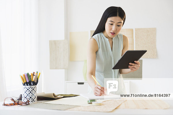 Business woman using tablet pc