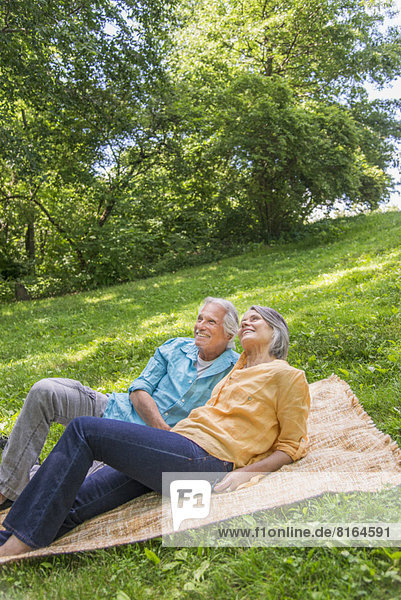 Senior couple relaxing in park