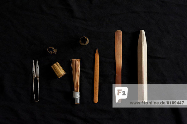 Traditional Japanese tools on black background