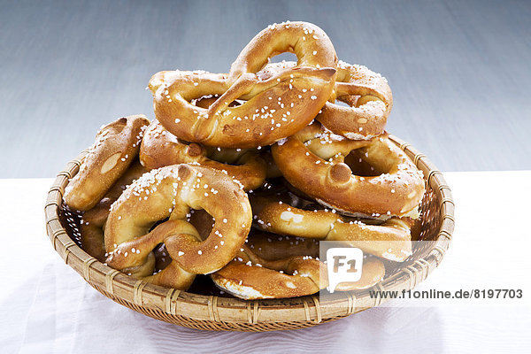 Basket of pretzels on table  close up