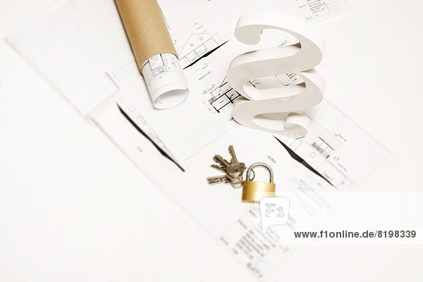 Lock and key paragraph sign on blue prints