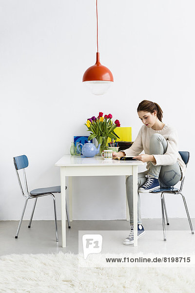 Young woman reading book