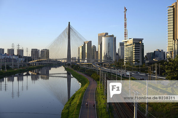 Modern skyscrapers and the Octávio Frias de Oliveira bridge over the Rio Pinheiros River