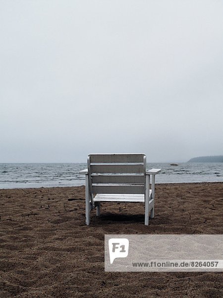 A chair on a deserted beach  Sweden.