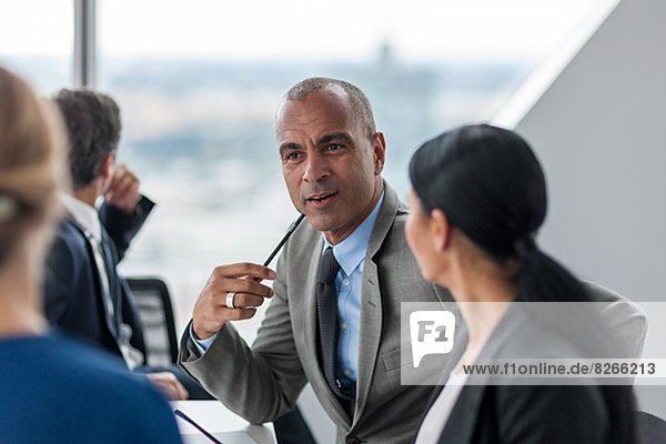 Businessman and businesswomen at meeting