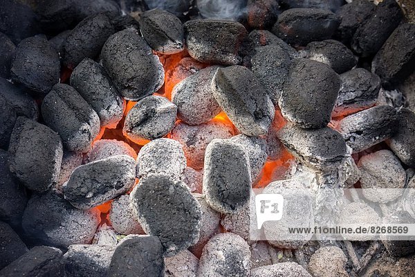 Hot coals ready for cooking in a barbecue in New York