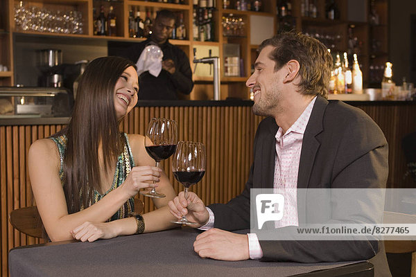 Couple drinking wine.