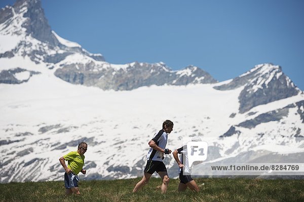 Runners in the Zermatt Marathon and the Matterhorn  Valais  Swiss Alps  Switzerland  Europe