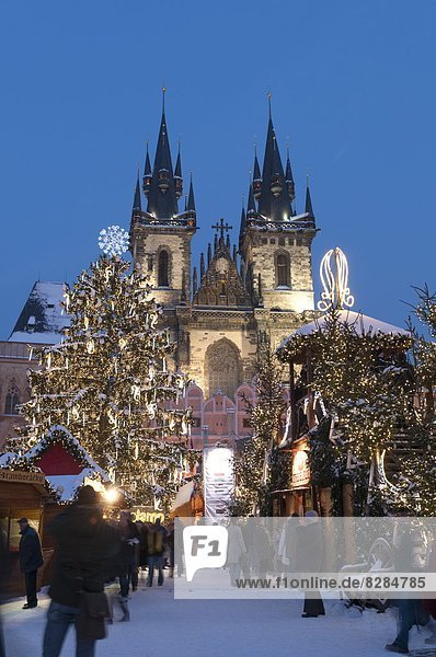 Snow-covered Christmas Market and Tyn Church  Old Town Square  Prague  Czech Republic  Europe