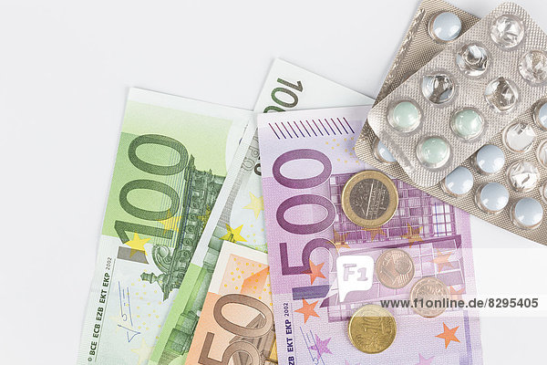 Tabletten  Euro-Banknoten und -Münzen