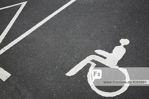 Germany  North Rhine Westphalia  pictogram of disabled parking space on asphalt