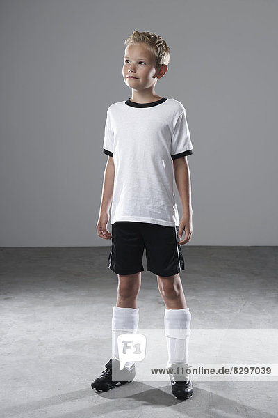 Boy in soccer jersey