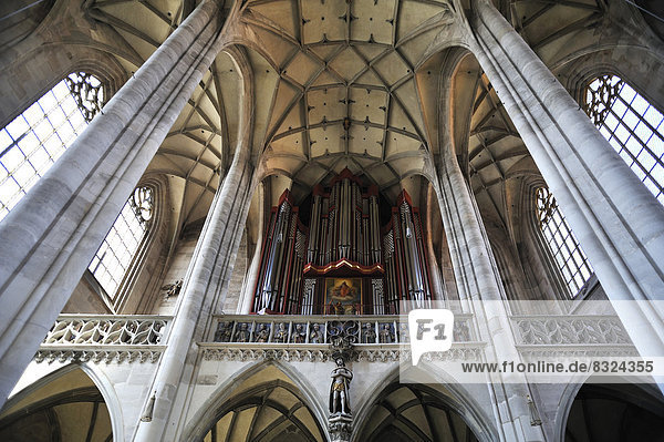 Rieger organ  completed in 1997  and vaulted ceiling of the late-gothic three-naved hall church  St. George's Minster  1499