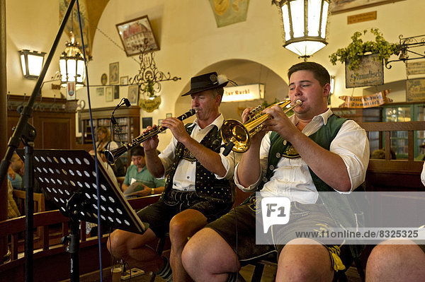 'Marching band performing in the ''Schwemme''  guest room  Hofbraeuhaus am Platzl beer hall'