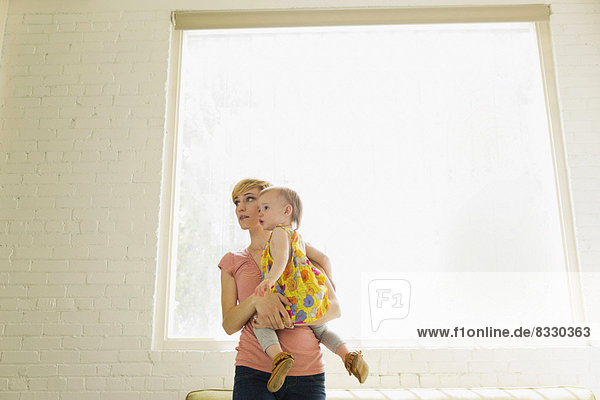 Mother with baby daughter (12-17 months)