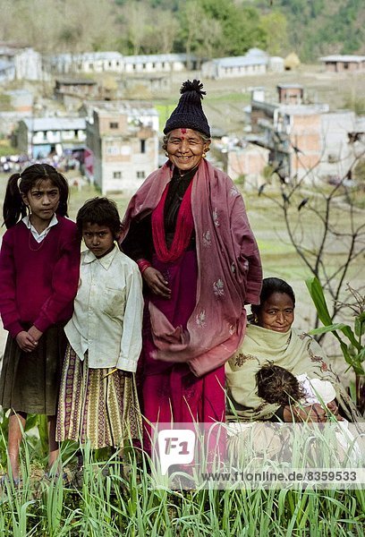 Women and children living in the foothills of the Himalayas at Pokhara in Nepal