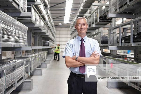 Portrait of manager in engineering warehouse