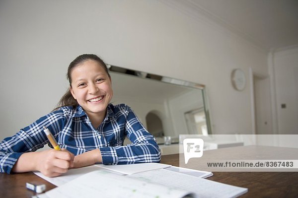 Teenage girl doing homework
