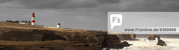 A Lighthouse And Cliffs Along The Coastline South Shields  Tyne And Wear  England