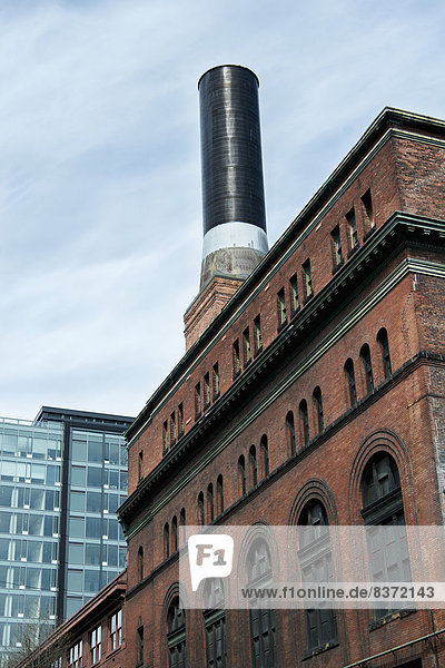A Smokestack On Top Of A Building Seattle  Washington  United States Of America