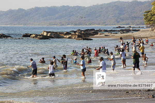 People Fishing Off The Beach At Mal Pais (Malpais) On The Nicoya Peninsula  Puntarenas Province  Costa Rica