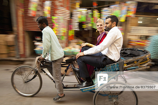 A Mixed Race Couple Riding In A Rickshaw  Ludhiana  Punjab  India