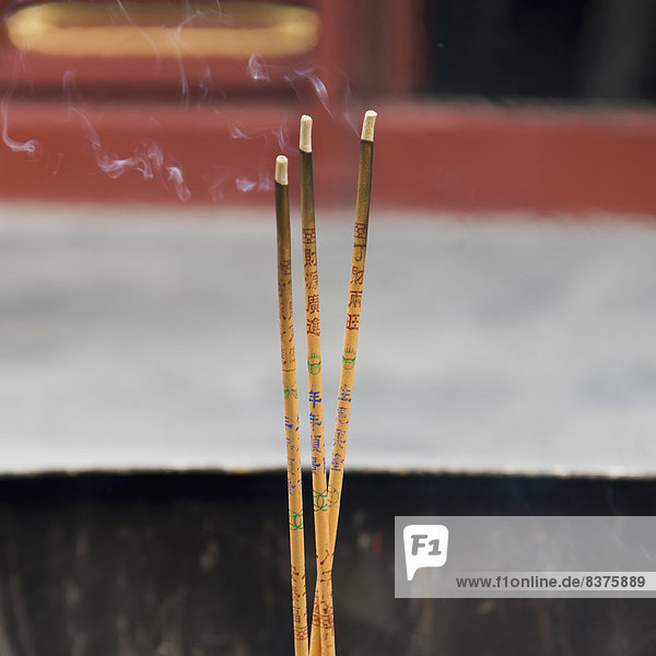 Burning Incense At Lama Temple  Beijing  China