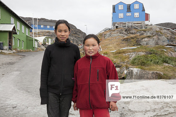 Two Inuit Girls In A Village  Kangaamiut  Greenland