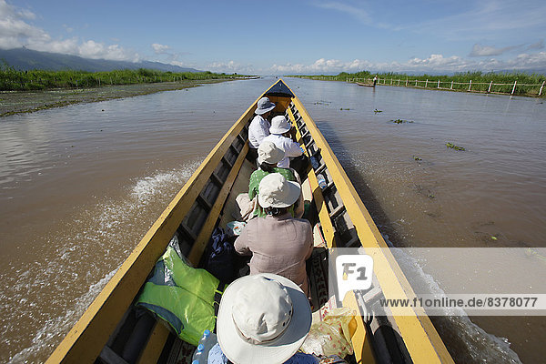 Travellers Use Boats To Move Along The Canals Of Inya Lake Shan State  Myanmar