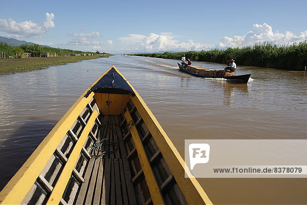 Travellers Use Boats To Move Along The Canals Of Inya Lake Shan State  Myanmar