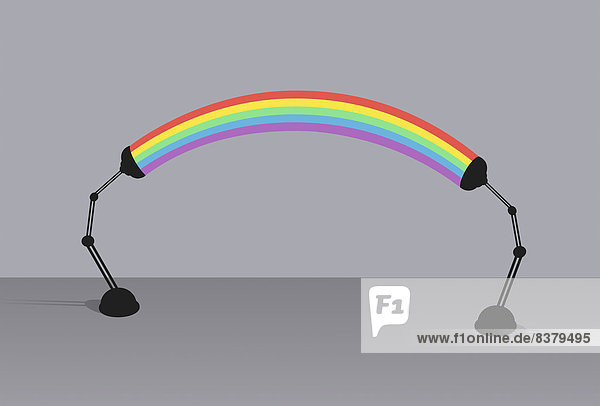 Regenbogen verbindet zwei Schreibtischlampen