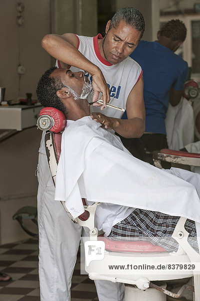 Barber at work  Mindelo  São Vicente  Cape Verde